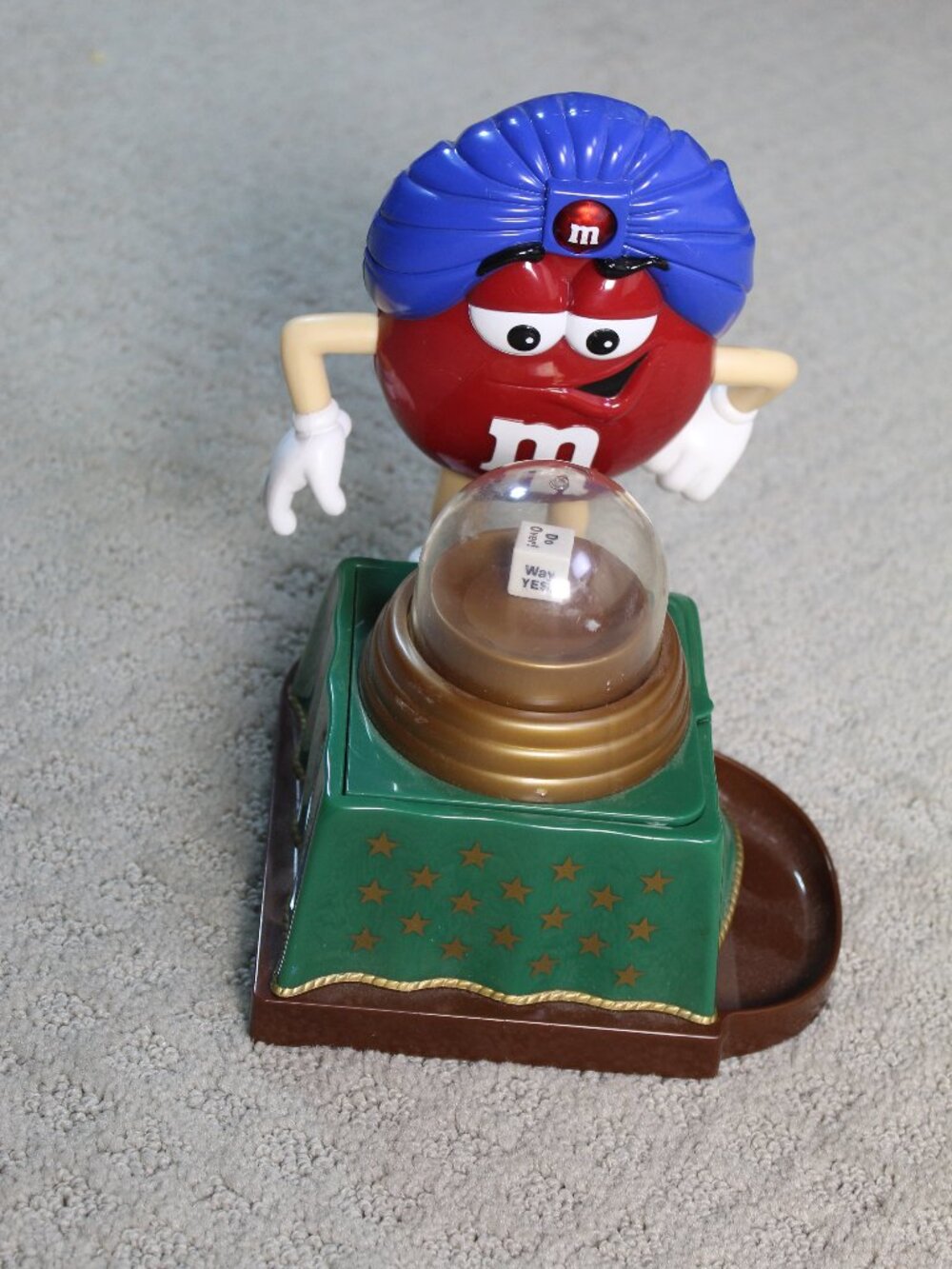 Vintage M&M's Red Fortune Teller candy dispenser features "The Great Red-ini"